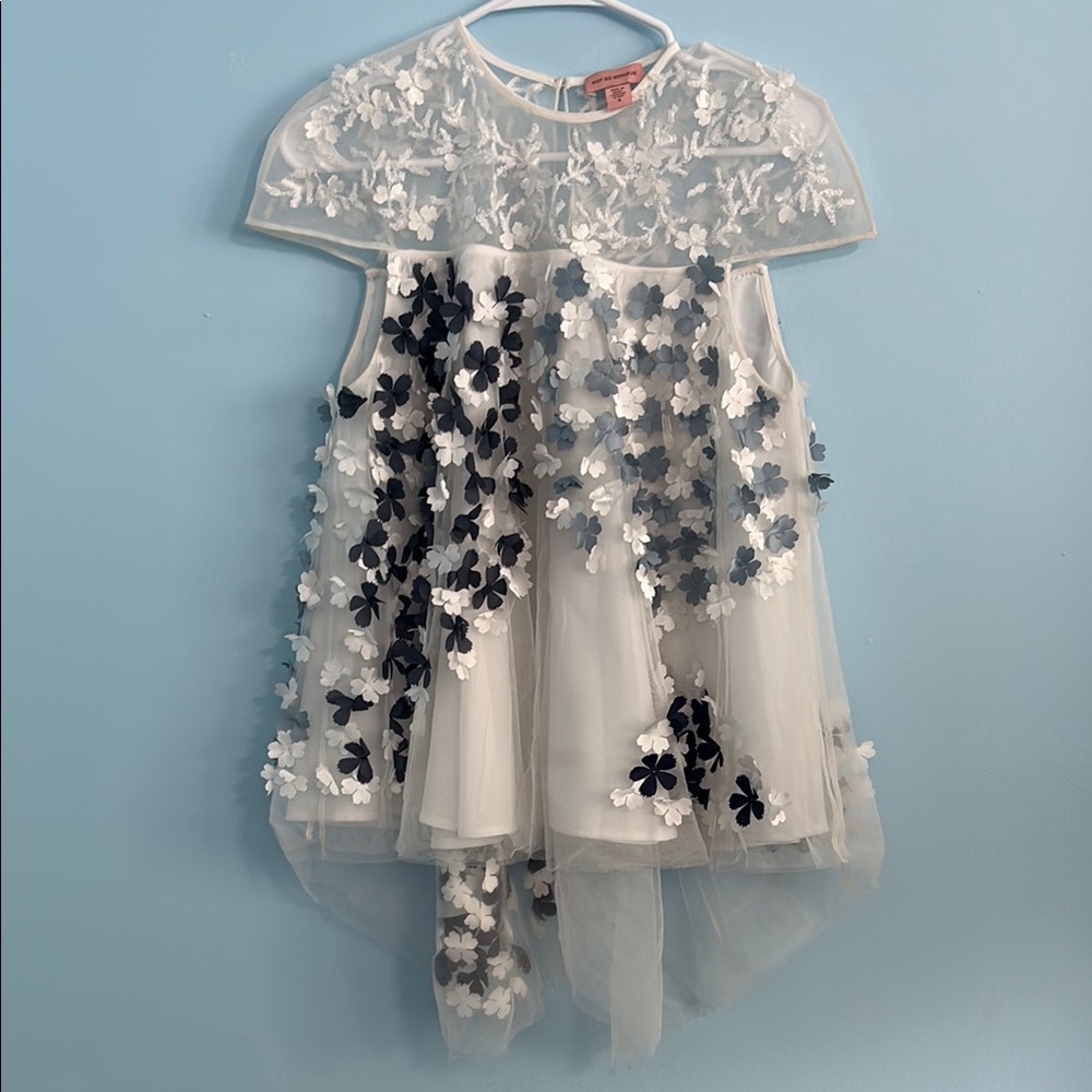 Chic Asymmetrical White and Blue Blouse with floral appliqué